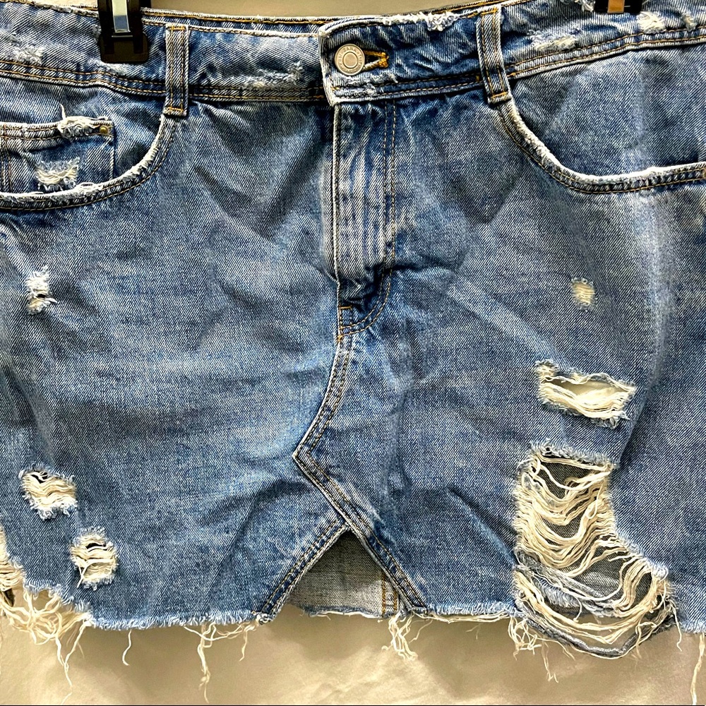 Cropped denim skirt.